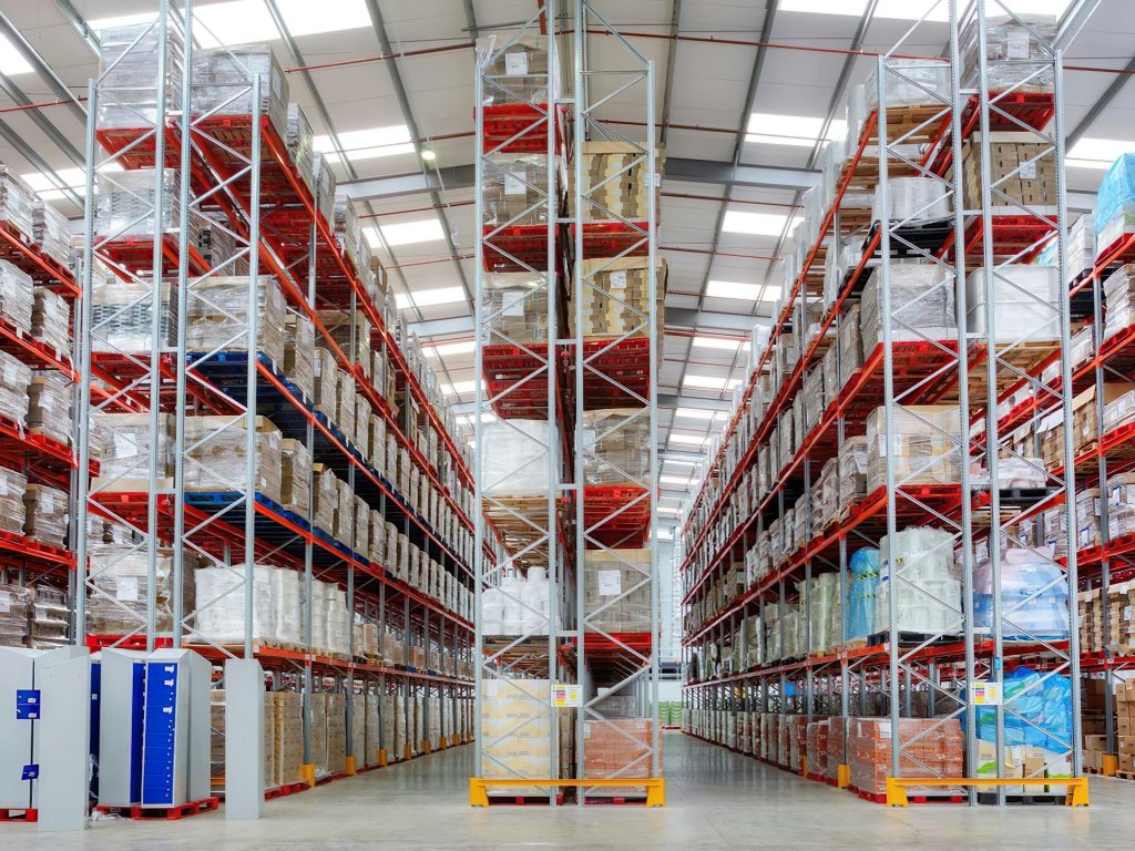 a large warehouse filled with lots of shelves